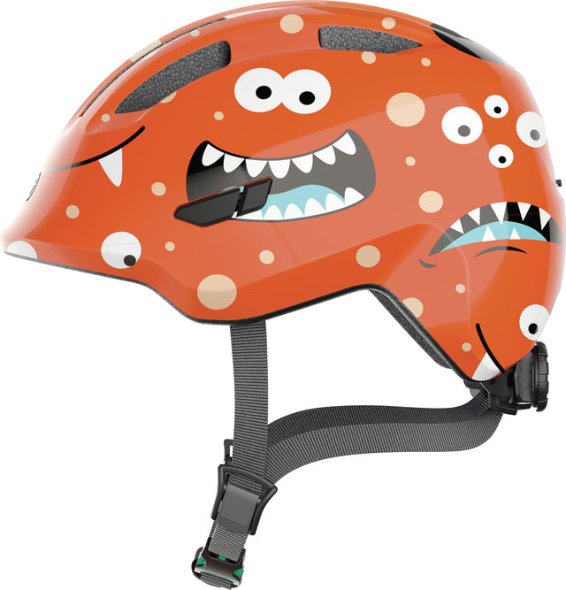 Abus Smiley 3.0 SE orange monster - grønt spænde - børne cykelhjelm